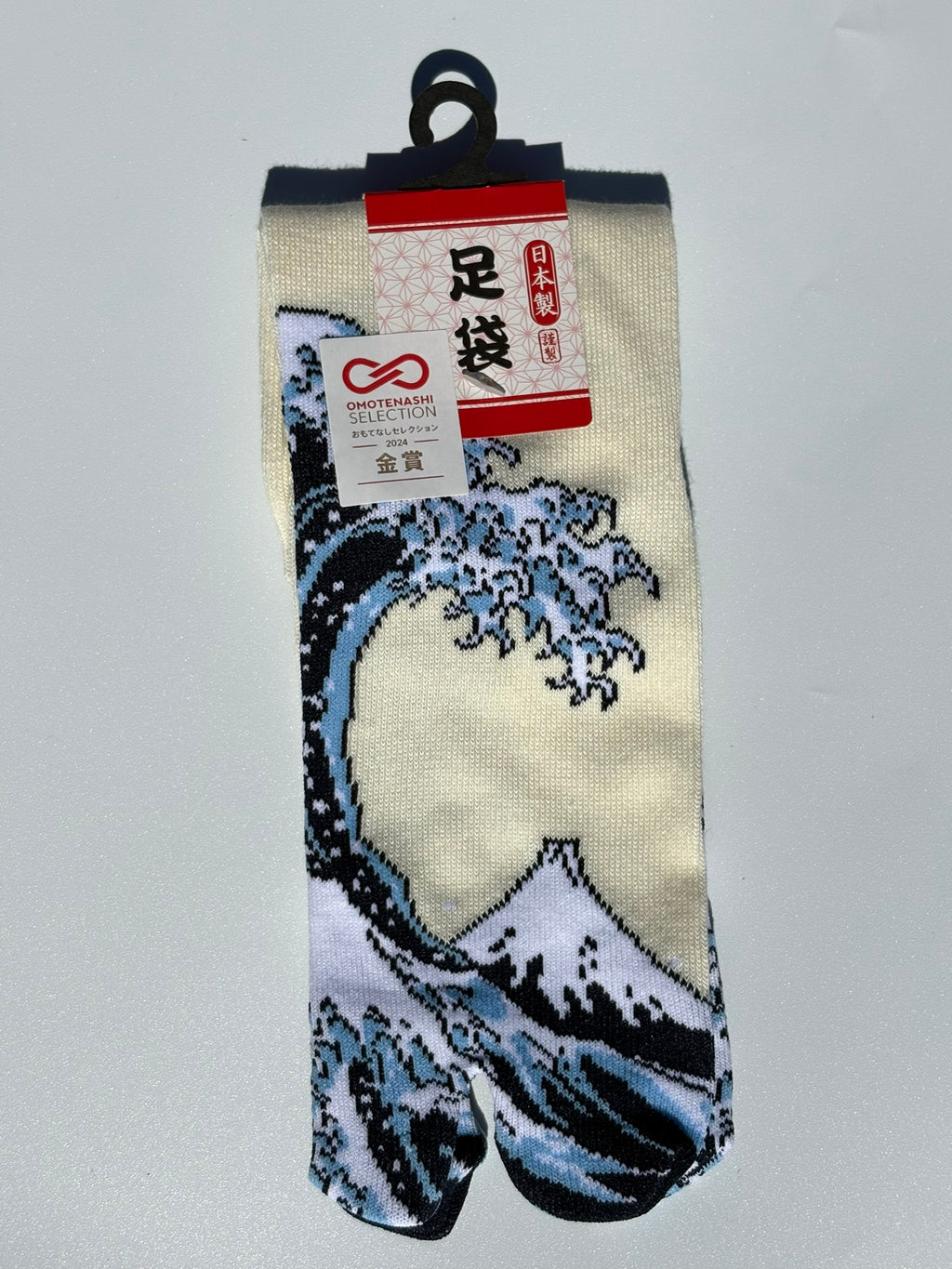 cream tabi split-toe socks with Hokusai Great Wave off Kanagawa print — Omotenashi Selection Gold Award 2024 Japanese-made art tabi socks (足袋)