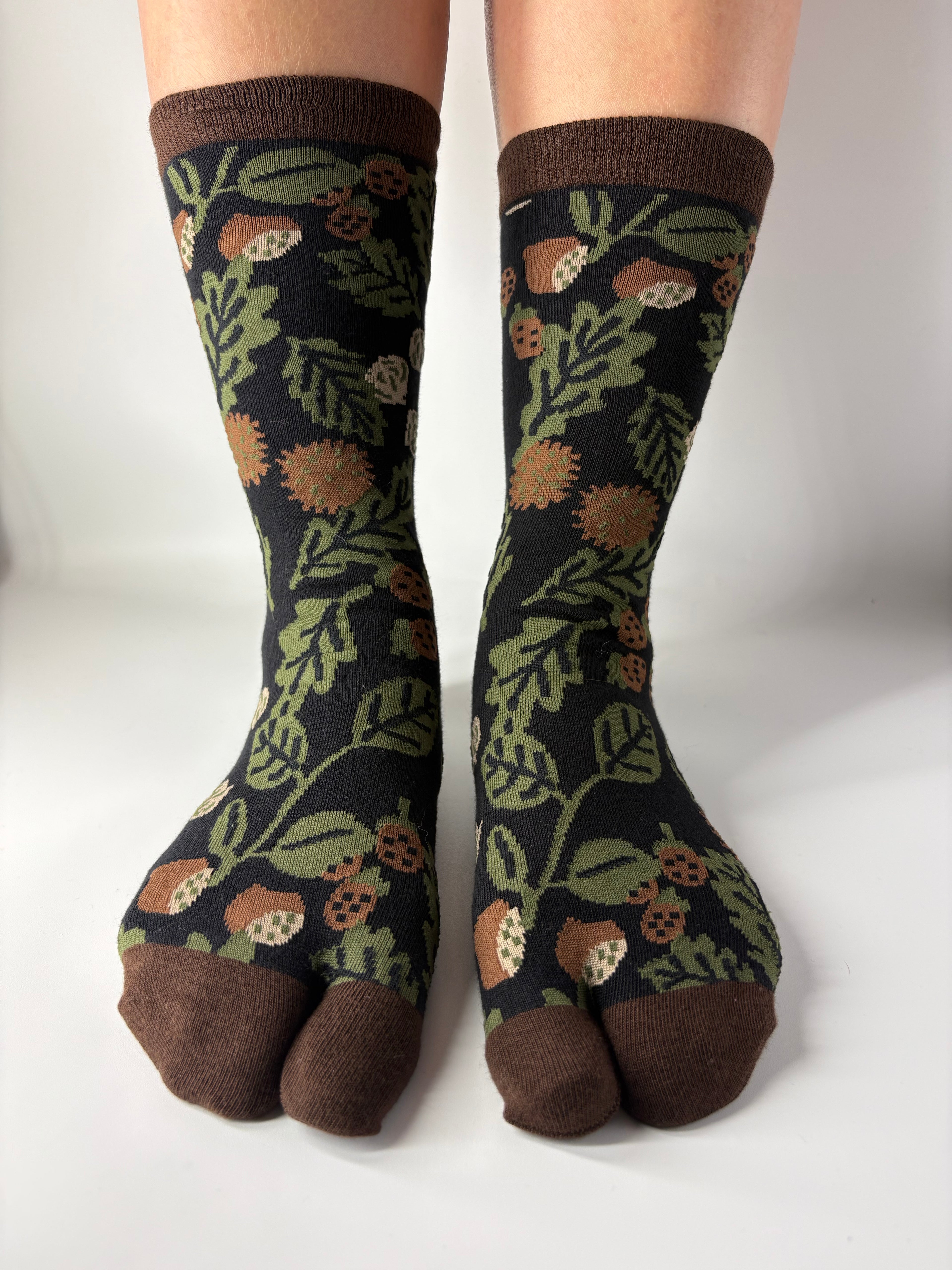 Brown split tow natural earth tabi socks on white background