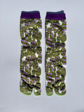 White tabi split-toe socks with bold abstract floral print in olive green and purple, purple cuff — Japanese patterned tabi socks of cotton material
