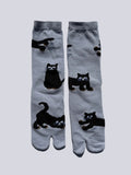 pair of slate blue tabi socks with a black cat print - premium cotton quality