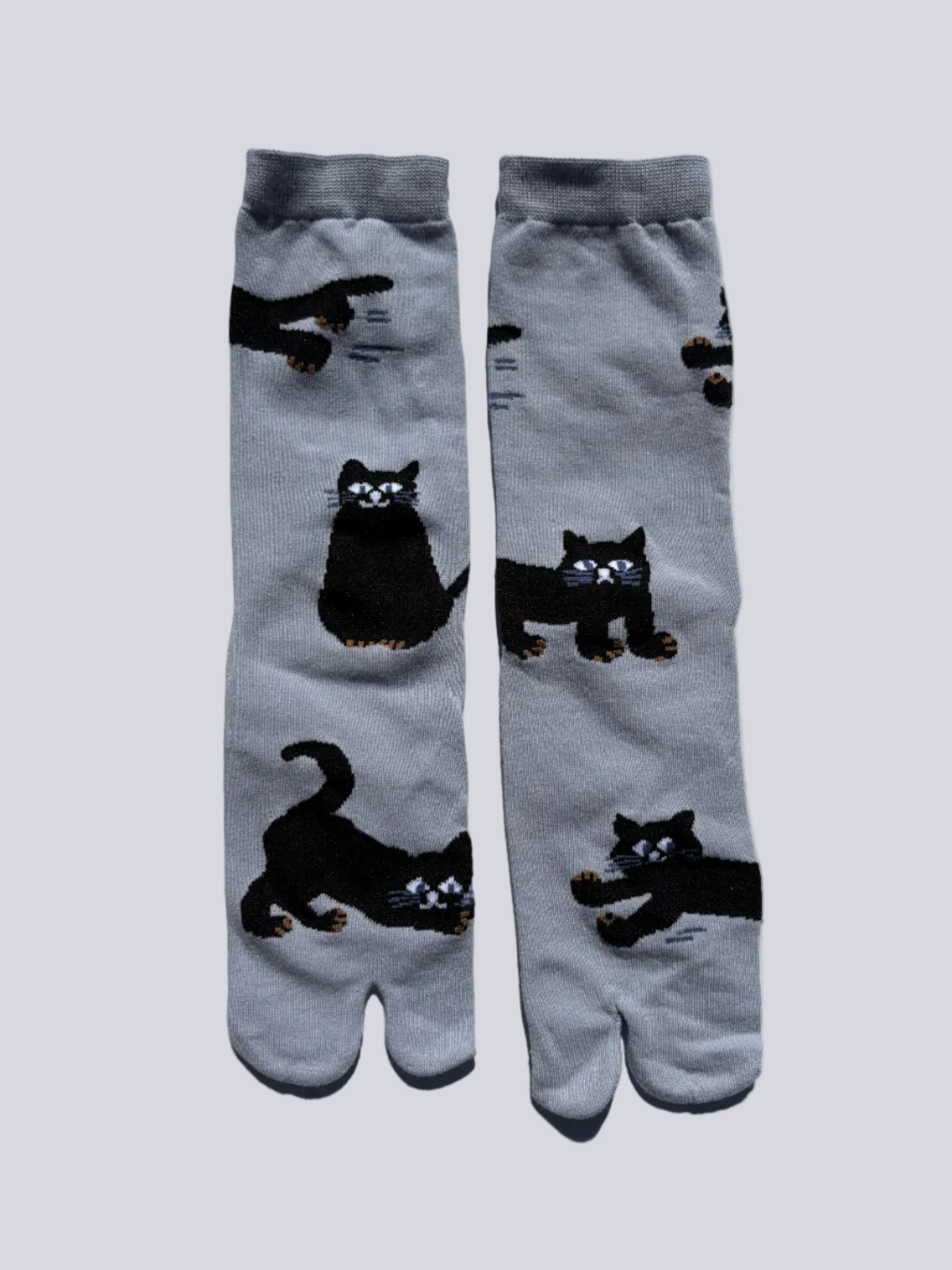 pair of slate blue tabi socks with a black cat print - premium cotton quality
