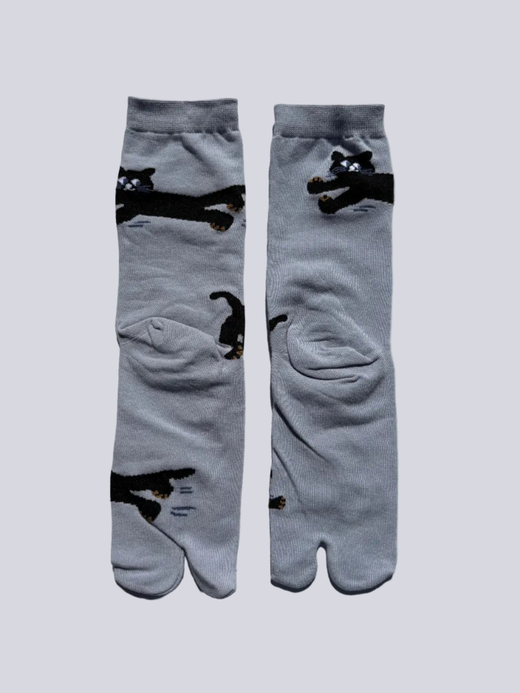 back of black cat print on japanese split toe tabi socks