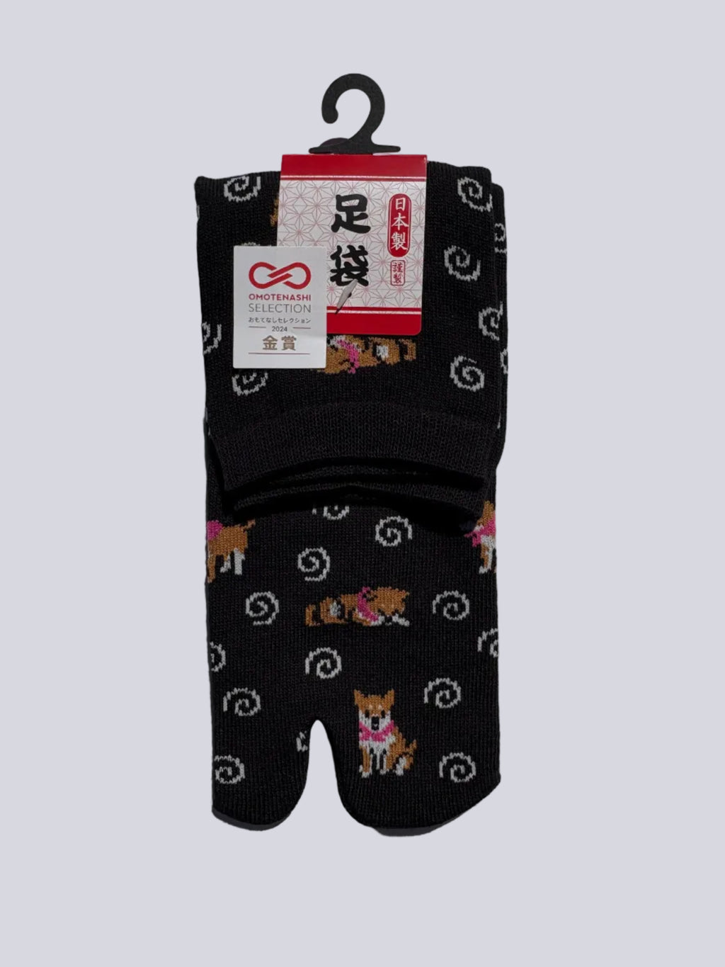 Pack of black tabi socks with shiba inu dog pattern on a white background