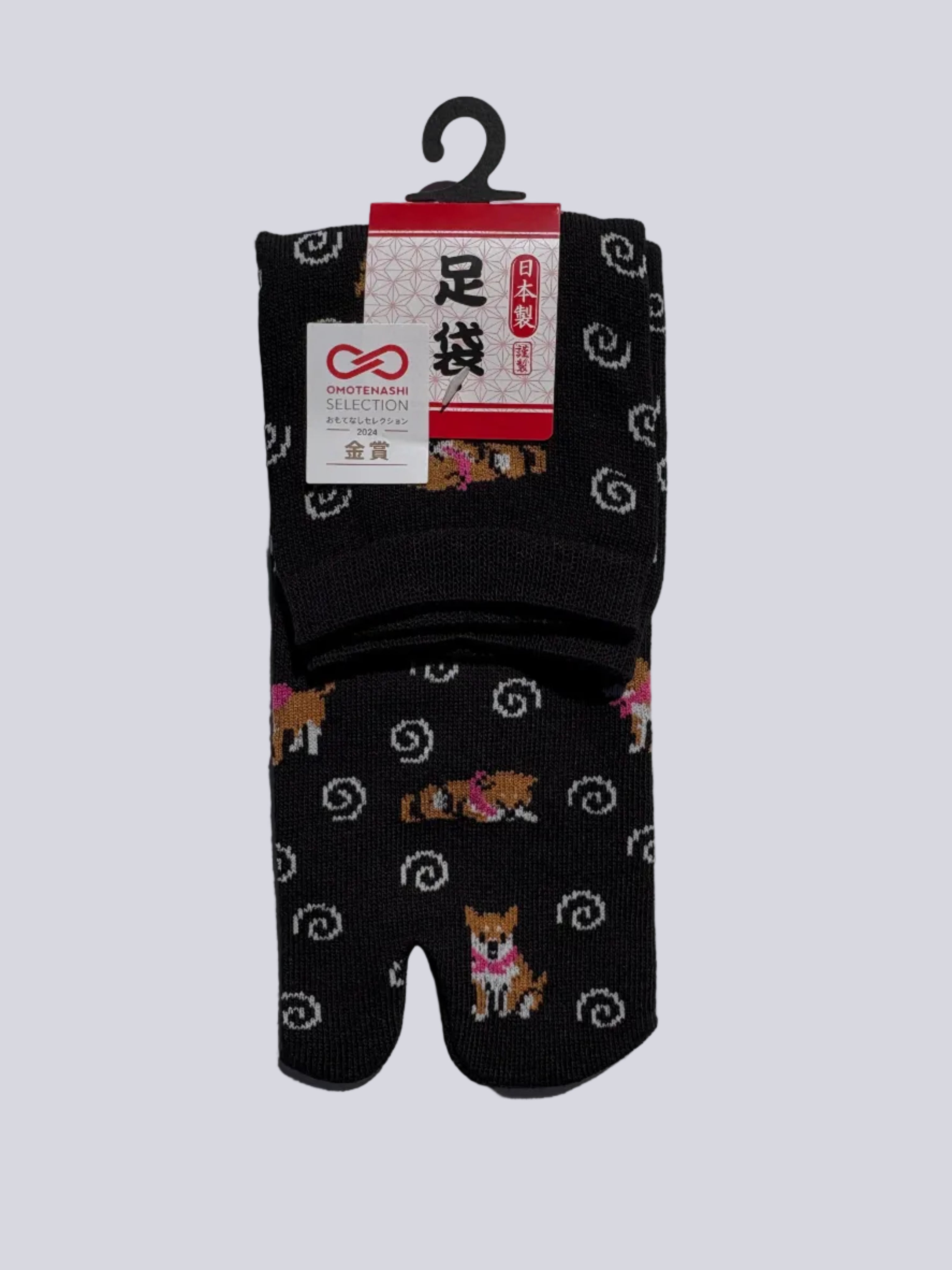 Pack of black tabi socks with shiba inu dog pattern on a white background