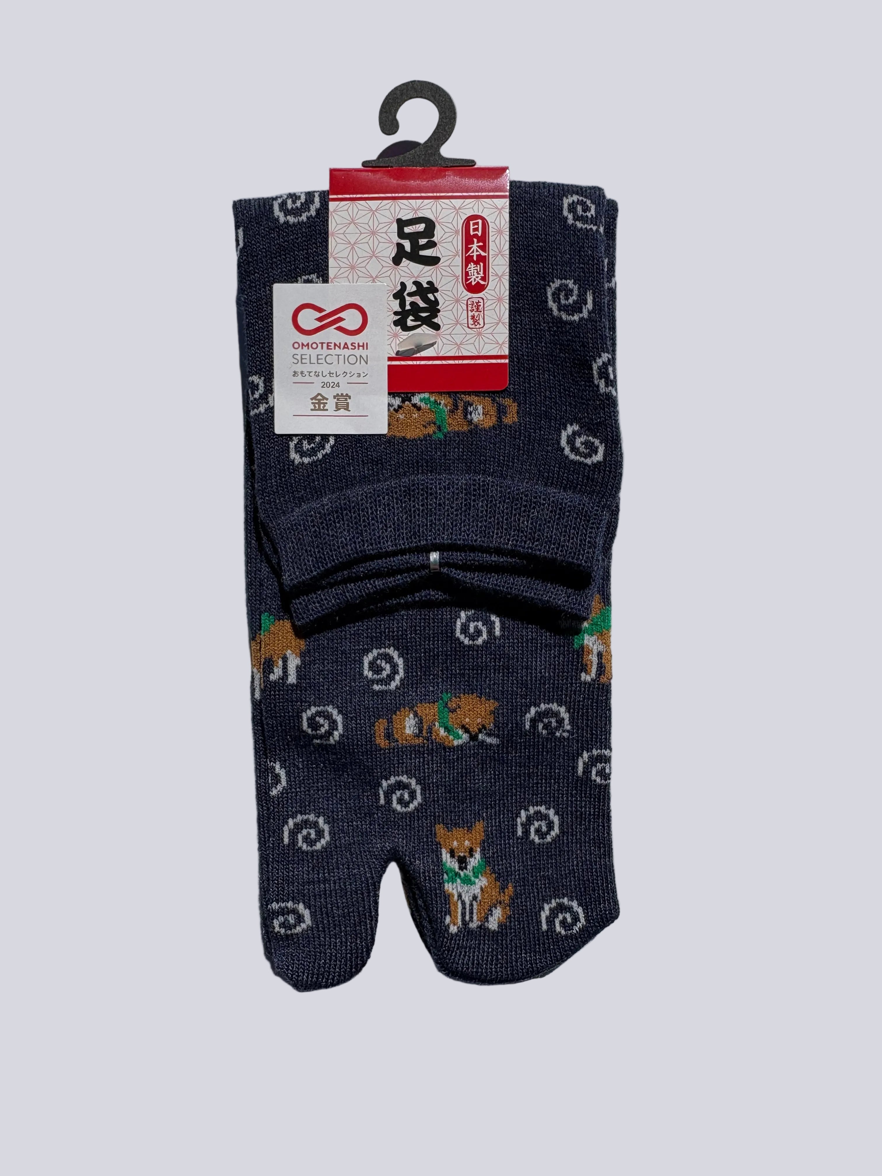 Pack of navy tabi socks with shiba inu dog pattern on a white background