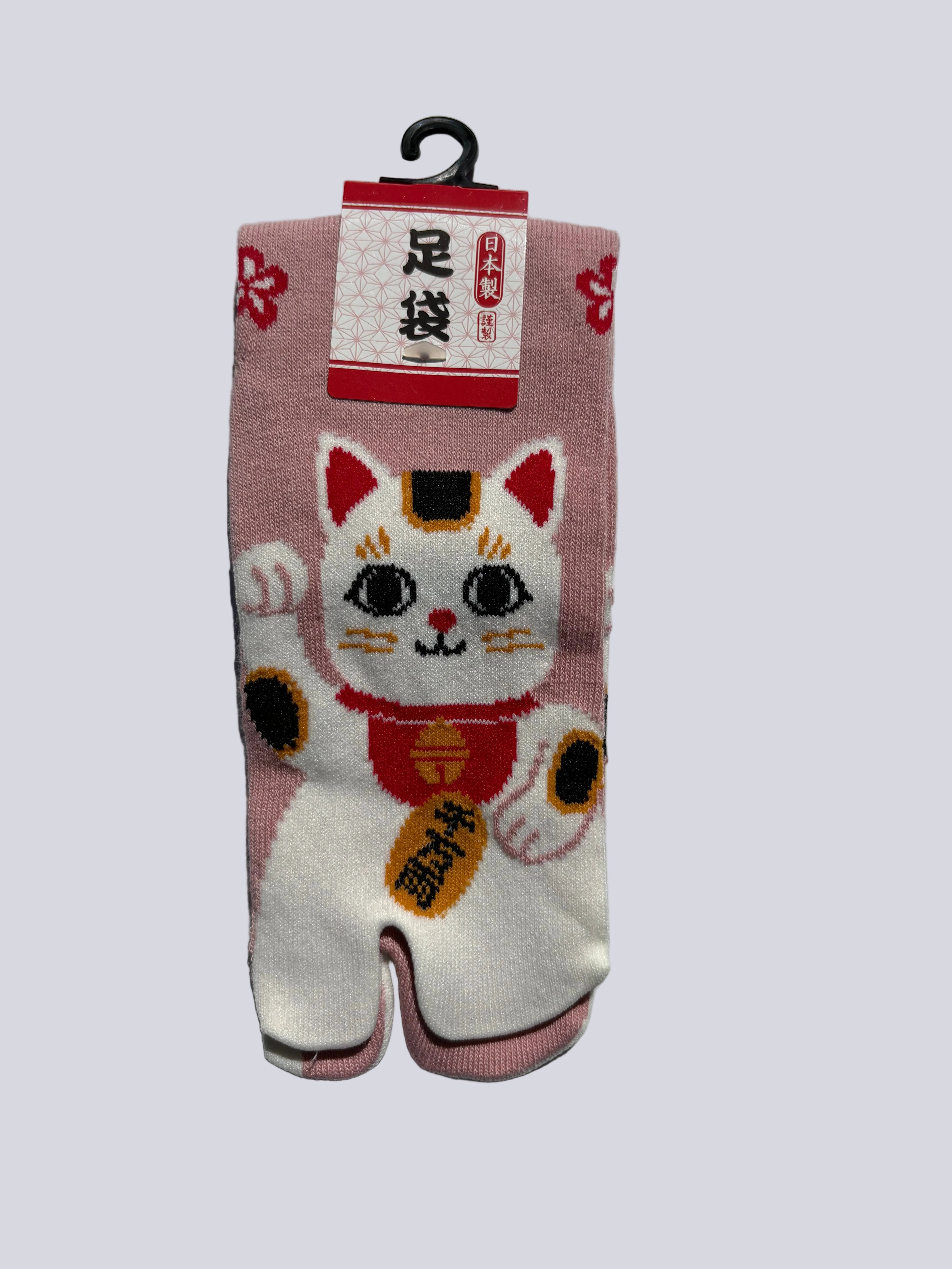 Pink tabi split-toe socks with maneki-neko lucky cat print and red floral pattern — Japanese-made novelty lucky cat tabi socks (足袋)