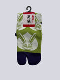 Green and white tabi split-toe socks with large Japanese rabbit (usagi) print and purple toe — Japanese-made novelty bunny tabi socks (足袋)
