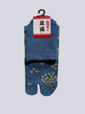 Blue tabi socks with floral pattern on a light gray background made in japan
