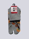 Grey tabi split-toe socks with Japanese persimmon (kaki) fruit and branch print — novelty Japanese-made tabi socks (足袋)