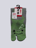 Pair of green tabi socks with a smiley frog face design on a white background