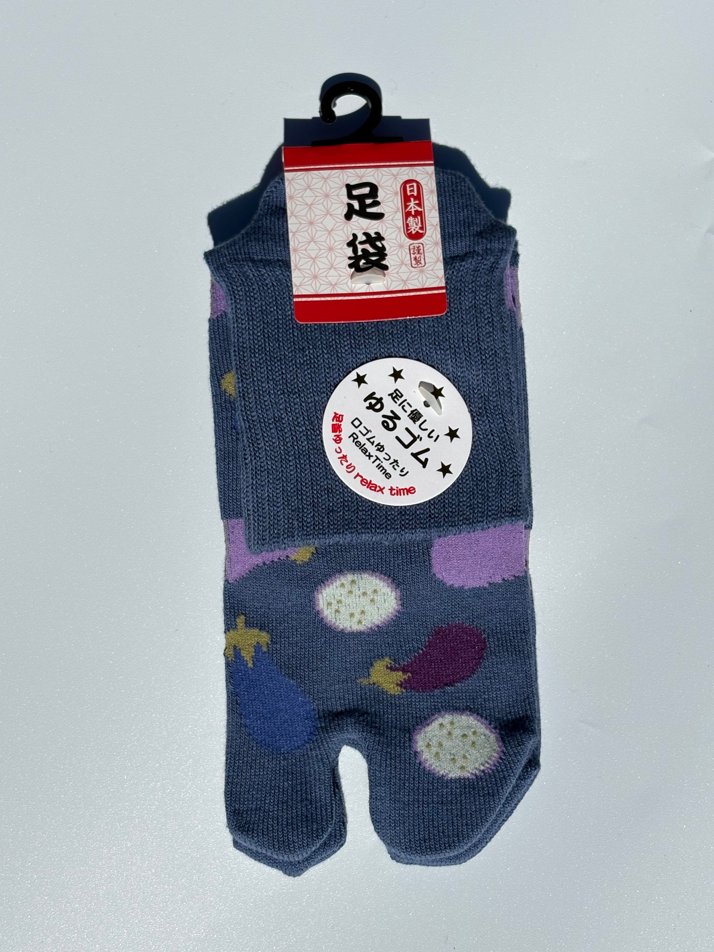 pair of blue Japanese tabi split-toe socks with aubergine and eggplant vegetable print  — soft elastic relaxed-fit tabi socks made in Japan