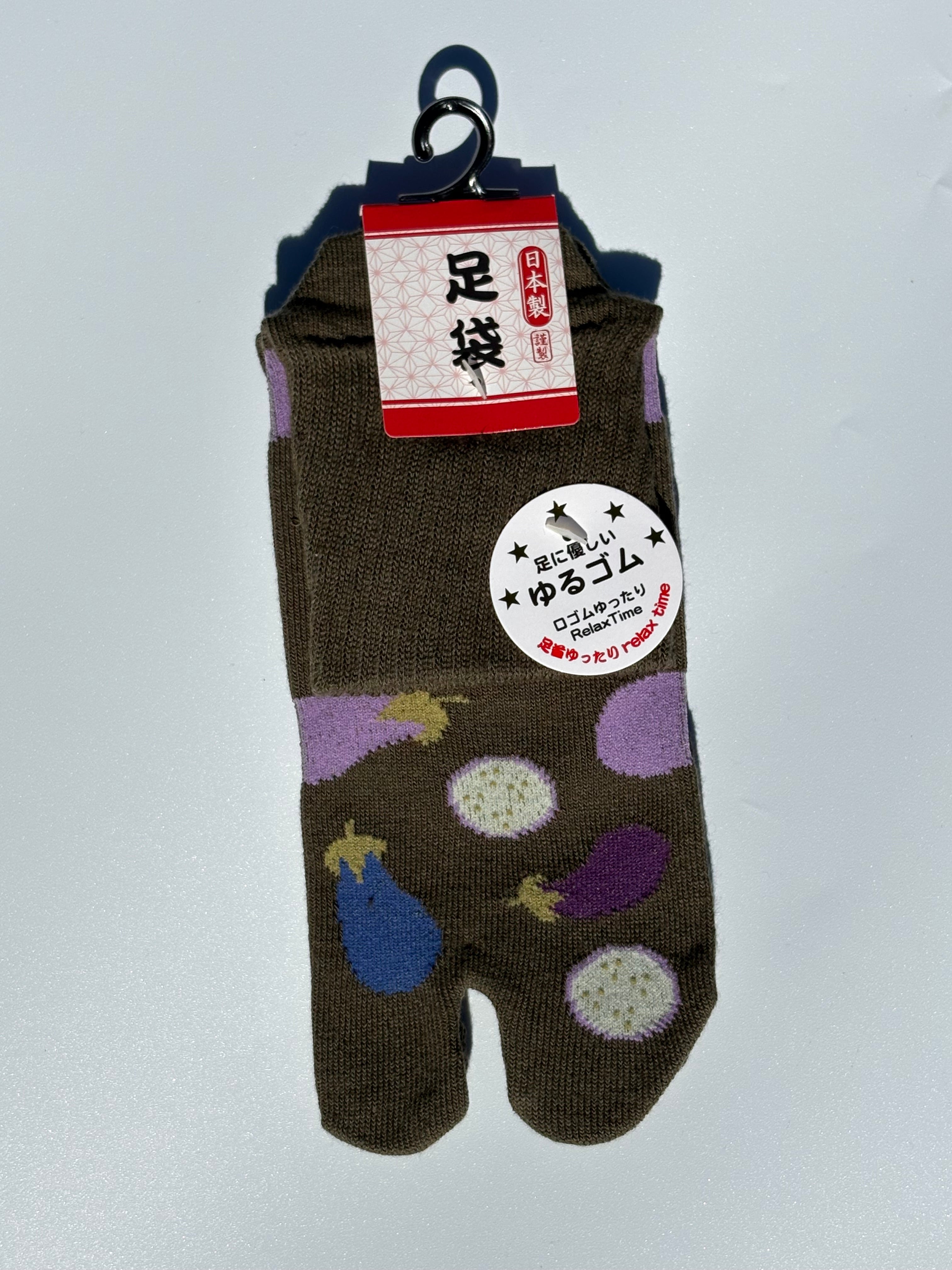 pair of olive green Japanese tabi split-toe socks with aubergine and eggplant vegetable print  — soft elastic relaxed-fit tabi socks made in Japan