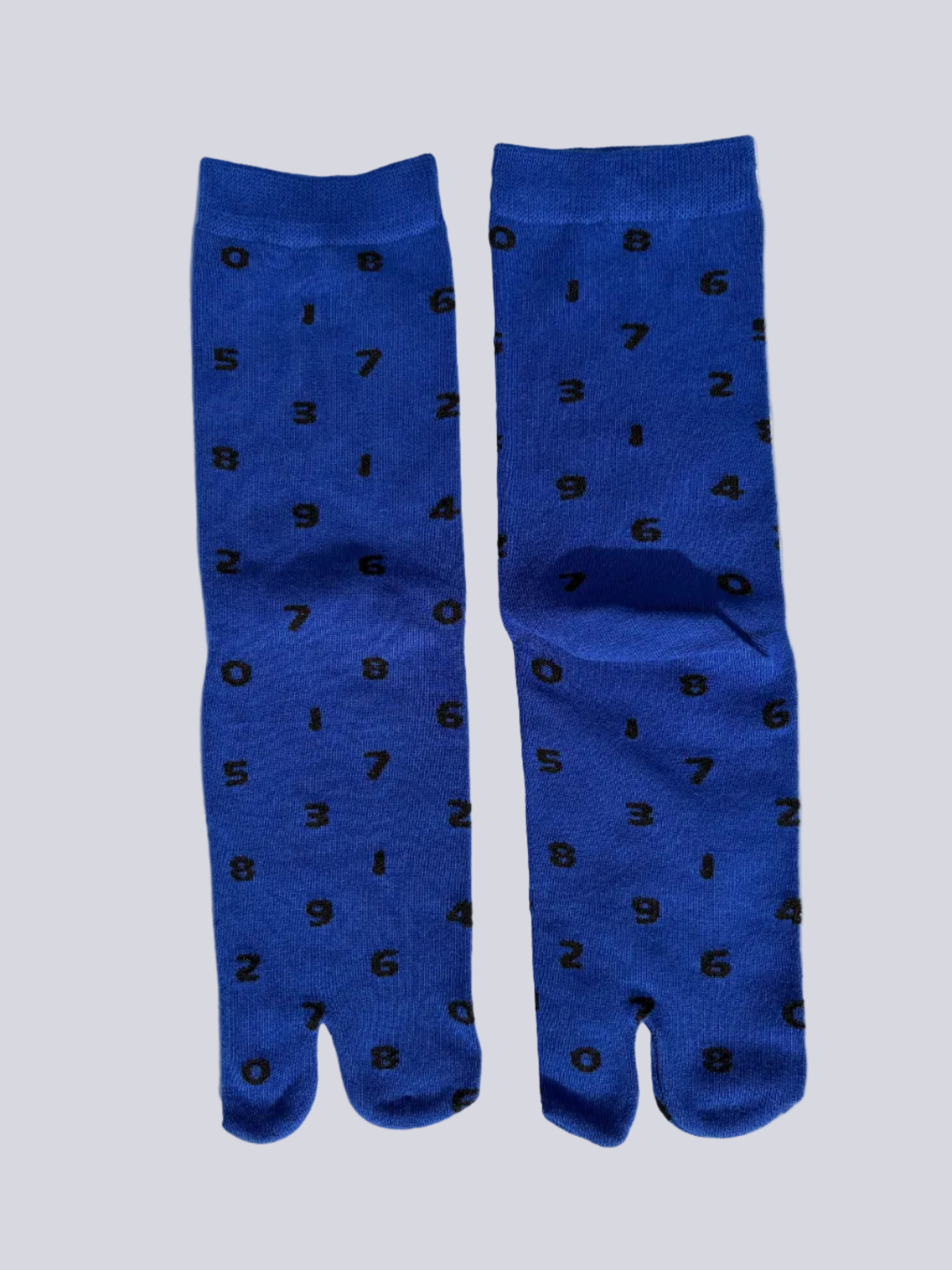 blue tabi socks with black numbers flat lay on a white background made of cotton japanese split toe design