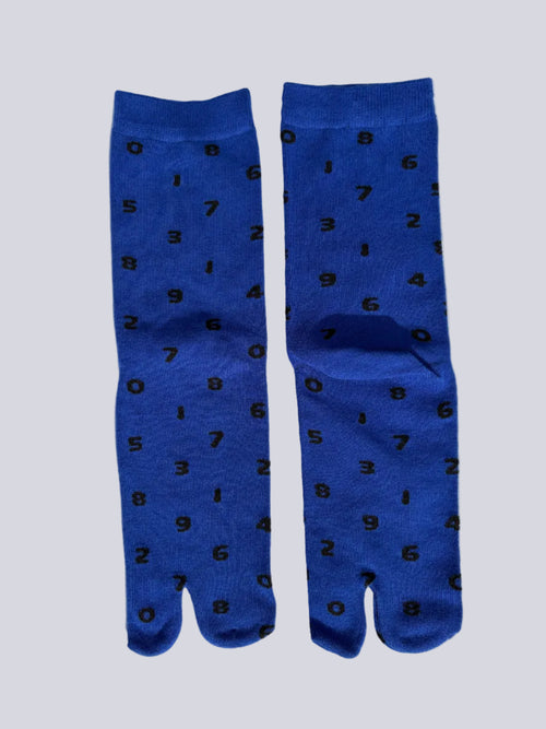 blue tabi socks with black numbers flat lay on a white background made of cotton japanese split toe design