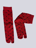 Red tabi socks with black patterns on a white background made of cotton japanese split toe design