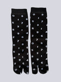 tabi split-toe socks flat lay—black cotton with white numbers — novelty Japanese split-toe socks crew length
