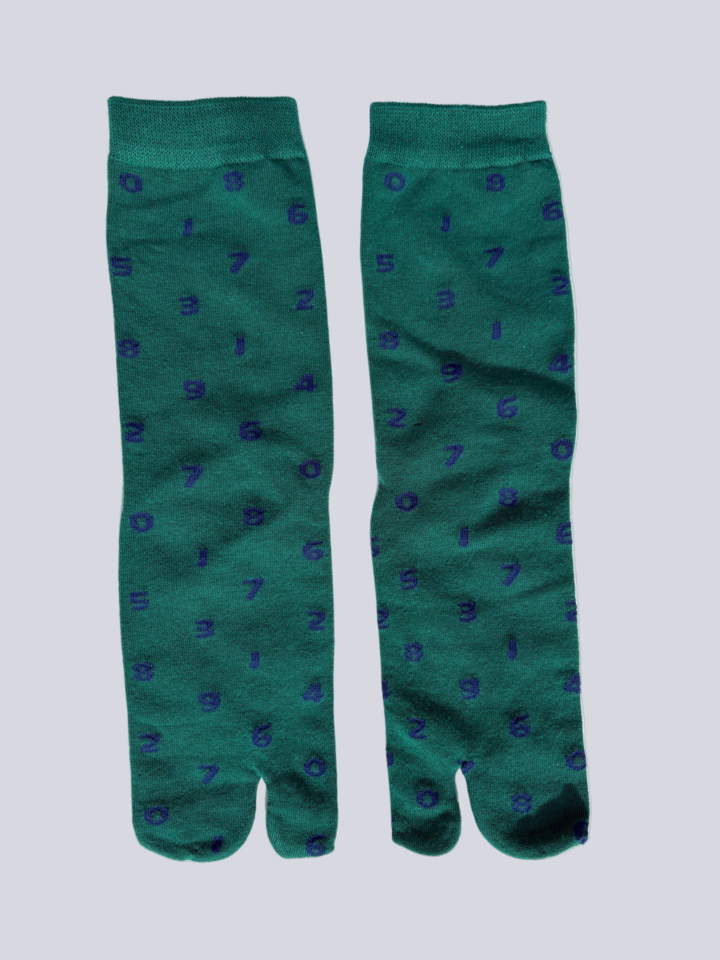 green tabi socks with dark blue numbers flat lay on a white background made of cotton japanese split toe design