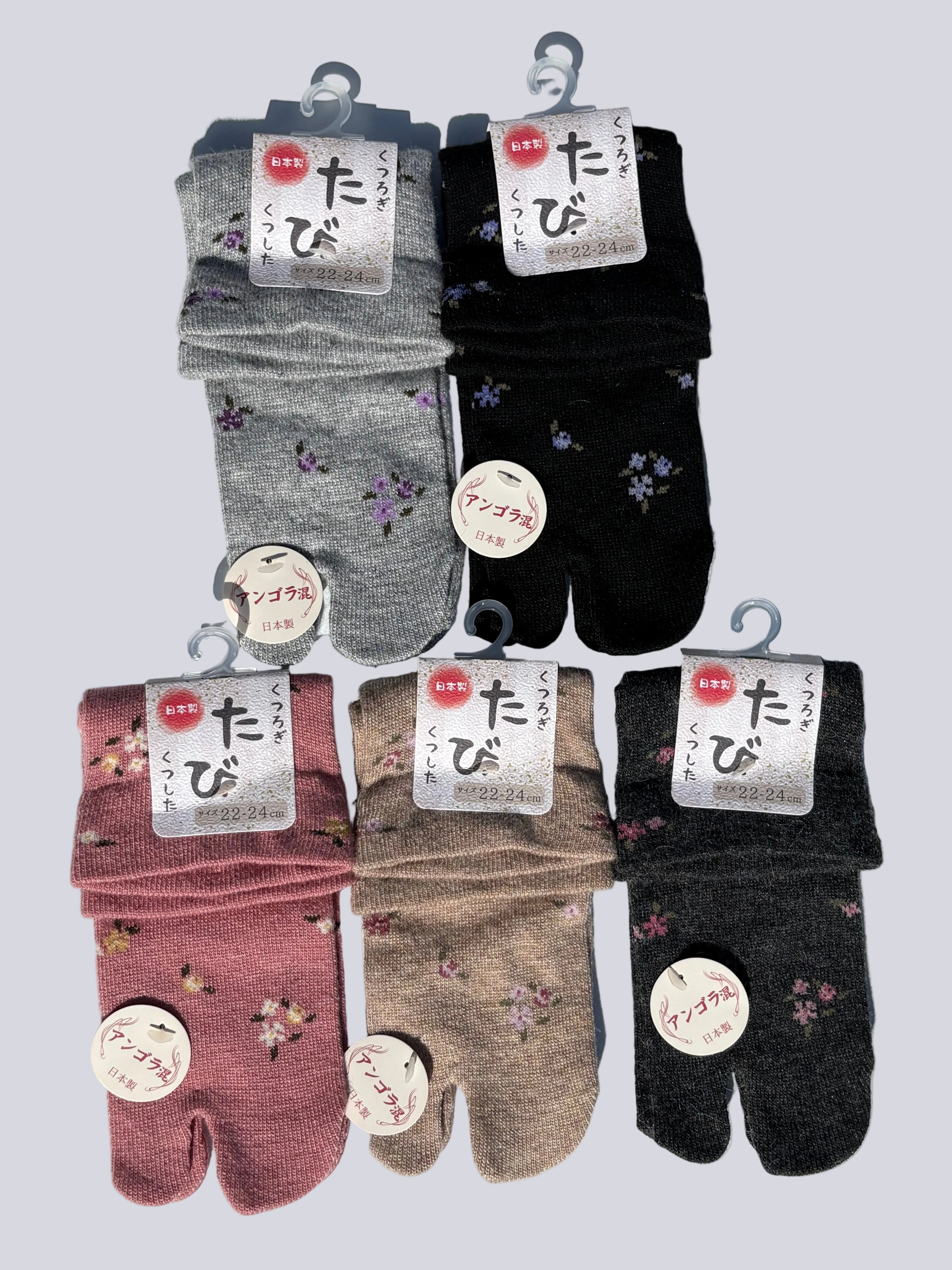 Five pairs of Japanese-made angora blend tabi split-toe socks in grey, black, pink, beige, and charcoal with delicate floral print — soft winter tabi socks made in Japan