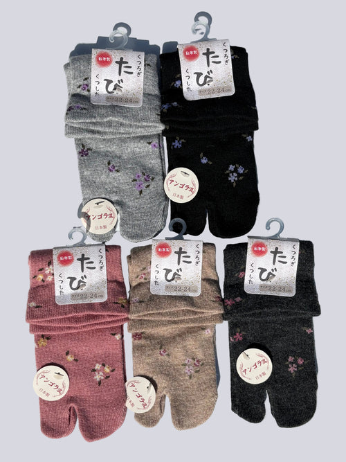 Five pairs of Japanese-made angora blend tabi split-toe socks in grey, black, pink, beige, and charcoal with delicate floral print — soft winter tabi socks made in Japan