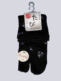 Black angora blend tabi split-toe socks with small floral print and loose fit cuff — soft Japanese-made tabi socks, size 22–24cm
