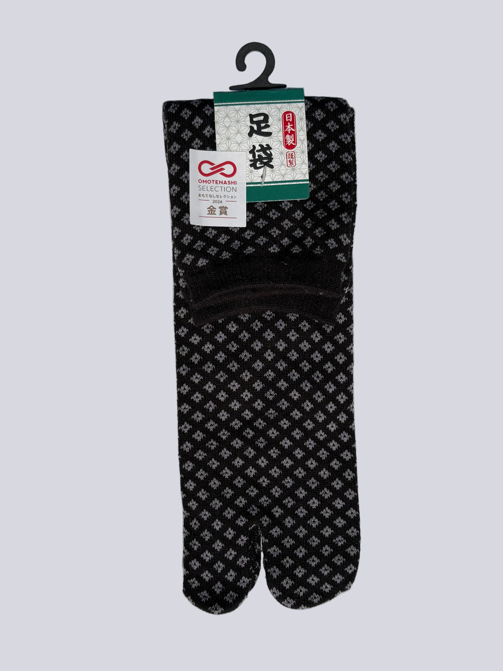 Single pair of black tabi split-toe sock toes showing traditional Japanese diamond (hishi) pattern - made in japan