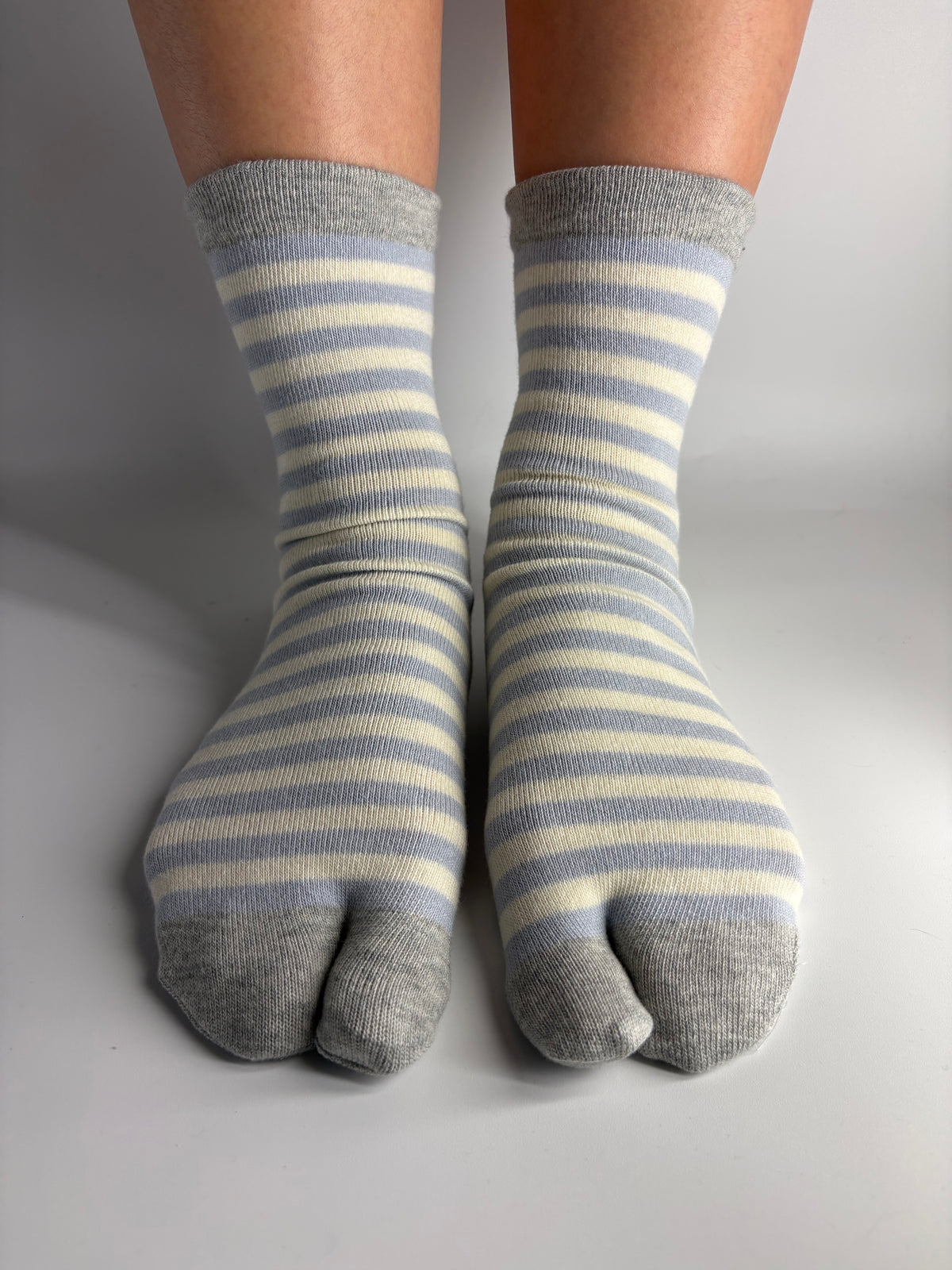 Powder blue and cream striped tabi socks with heather grey split-toe and cuff — Morning Sky Stripe by Tabi Co., made in Japan.