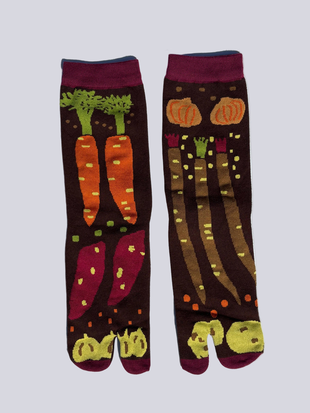 Brown tabi socks with a printed pattern of carrots, onions and parsnips — vegetable print split-toe socks by Tabi Co.