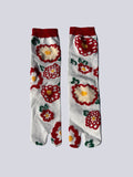 Pair of socks with floral pattern on a white background